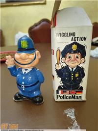 POLIZIOTTO A MOLLA MADE IN JAPAN CON SCATOLA